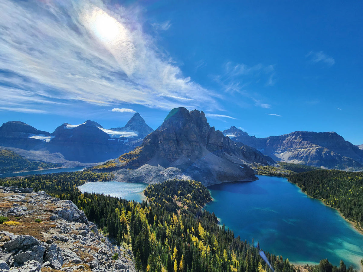 Mountainous landscape with a lake and clear blue sky