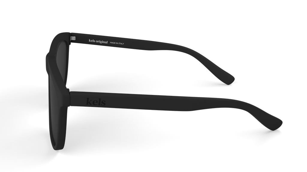 Black sunglasses with 'kools' branding on a white background