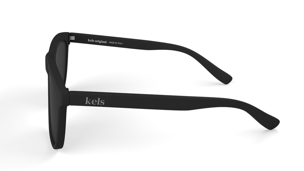 Black sunglasses with 'kels' branding on a white background